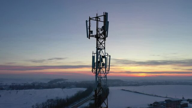 Telecommunication tower of 4G and 5G cellular. Base Station or Base Transceiver Station. Wireless Communication Antenna Transmitter. Telecommunication tower with antennas against blue sky.