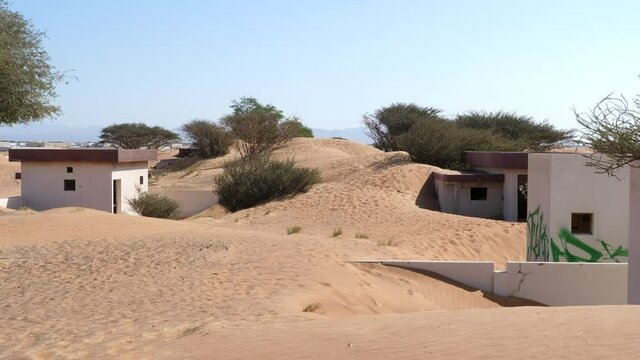 Static Shot of Abandoned Houses in Al Madam Ghost Town. UAE Desert.