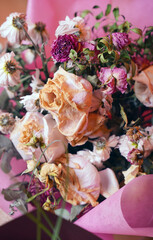 Close up of wilted flowers. Texture of different withered flowers.
