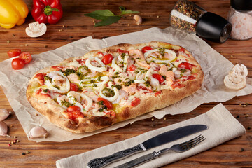 Roman pizza, variant of classic Italian pizza, wooden background