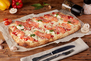 Roman pizza, variant of classic Italian pizza, wooden background