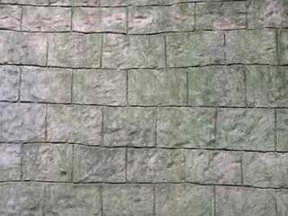 Fragment of a gray wall with rough stone masonry. Not seamless texture