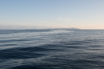 Ionian Sea. Calm and peaceful time at open sea before the sunset.