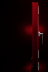 Red aluminium profile window on reflective glass