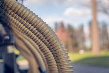 Close up of row of industrial hoses