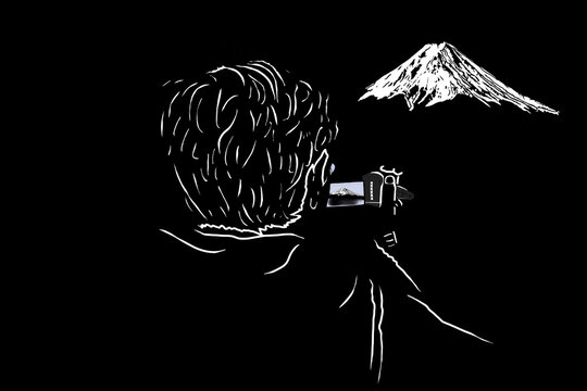 cineasta che filma montagna e panorama