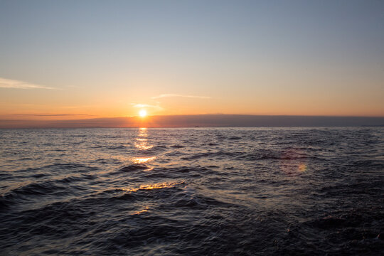 Sunrise over the Mediterranian Sea. Calm and peaceful time at Ionian sea. © Elena Shu