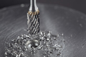Milling сutter and drill bit make sink in hole in steel billet. Locksmith work.
