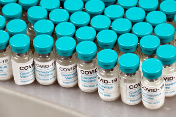 Covid-19 vaccines on laboratory shelf
