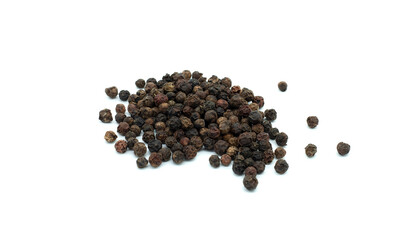 Black peppercorns on a white background. Close-up. Сlassic spice, the most famous. 