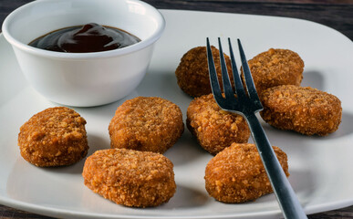 chicken nugget with buffalo sauce