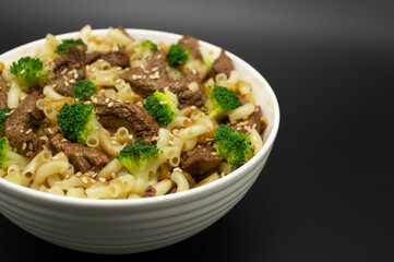 Asian food, meat with vegetables and sesame