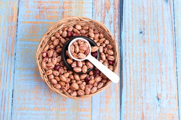 
Natural bean grains
Phaseolus vulgaris on blue grain wood background