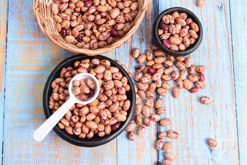 
Natural bean grains
Phaseolus vulgaris on blue grain wood background