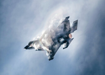 F-35 Lightning Jet producing sonic boom clouds