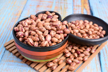 
Natural bean grains
Phaseolus vulgaris on blue grain wood background