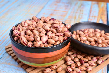 
Natural bean grains
Phaseolus vulgaris on blue grain wood background