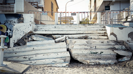 Fototapeta premium Alicante, Spain - December, 2020: Beach staircase destroyed by heavy storm Dana in September, 2019 In Torre de la Horadada