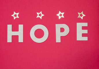 Hope message written in wooden letters.