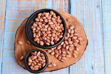 
Natural bean grains
Phaseolus vulgaris on blue grain wood background