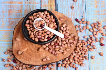 
Natural bean grains
Phaseolus vulgaris on blue grain wood background