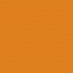 Seamless pattern of small triangles floating on a curry color background