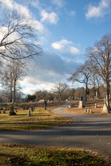 Fototapeta premium Landscape of Linwood Cemetery Haverhill MA. Graveyard founded in 1830. Historic site with many old and interesting graves and tombs.