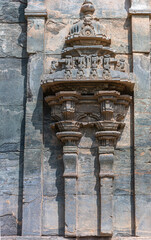 Lakkundi, Karnataka, India - November 6, 2013: Brahma Jinalaya temple. gray and brown stone...