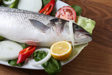 Raw bonito with onion lemon and tomato