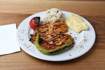 Grilled chicken with rice and mashed potato