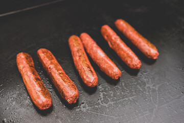 plant-based food, vegan plant-based mock meat sausages on outdoor barbecue