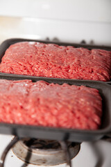 Two Open Packages of Ground Beef