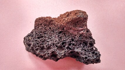 specimen Scoria igneous rock, black and brownish red color from the central java volcano,...