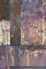 Old aged weathered rusty corroded coat iron sheets texture pattern background, multiple vertical rusted corroding grunge metal patch plates, rustic patched wall macro closeup, large detailed textured