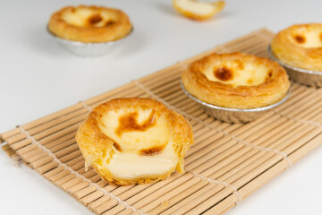 Baked egg tart on white background