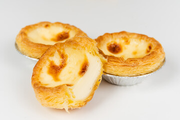 Baked egg tart on white background