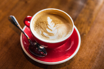 cappuccino coffee in red cup 