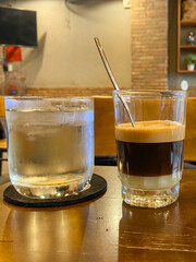 Vertical photo of Vietnamese fin coffee with condensed milk