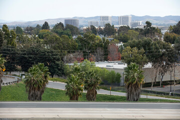 Fototapeta na wymiar Daytime view of the empty 55 Freeway through Irvine, California due to the COVID-19 pandemic.