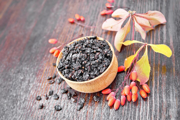 Barberry dried in bowl on board