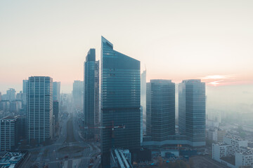 Breathtaking panorama of the Warsaw skyscrapers in the misty morning. High quality photo