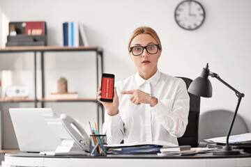 Woman trying to meet deadline in office