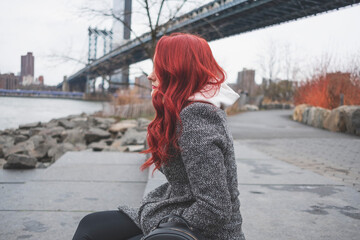 Fototapeta premium Woman With Red Hair, Williamsburg Bridge, Brooklyn, New York City