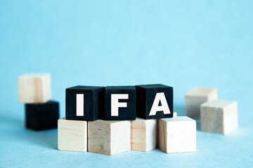 IFA. The text is on the dark and light cubes. Bright solution for business, financial, marketing concept
