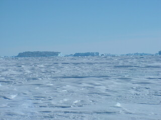 Naklejka na ściany i meble antarctica ice icebergs sea snow winter day