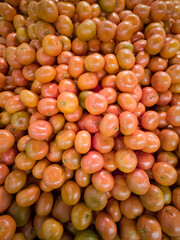 Bright orange tangerines a bunch of fruity background