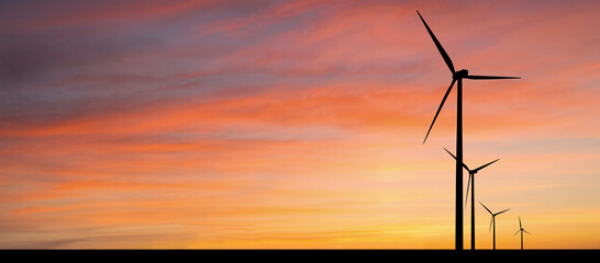 Wind turbines at sunset