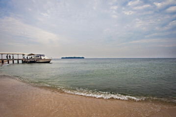 Boat and Jetty in Kelor Island in Thousand Archipelago in North Jakarta, Indonesia. Kelor island is a popular tourist destinaton.
