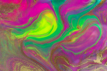 Gold glitter texture on fluorescent inks marble background.