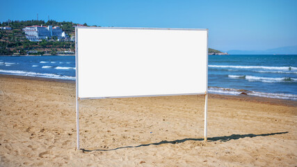 Big information advertising white banner with empty place for mockup on sandy beach